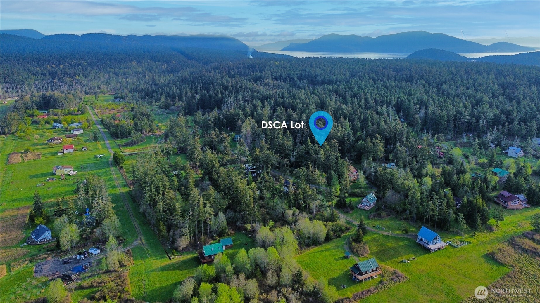 0 Decatur Beach Lane Anacortes, WA 98221 - Photo 12 of 20 a view of a lush green hillside and houses