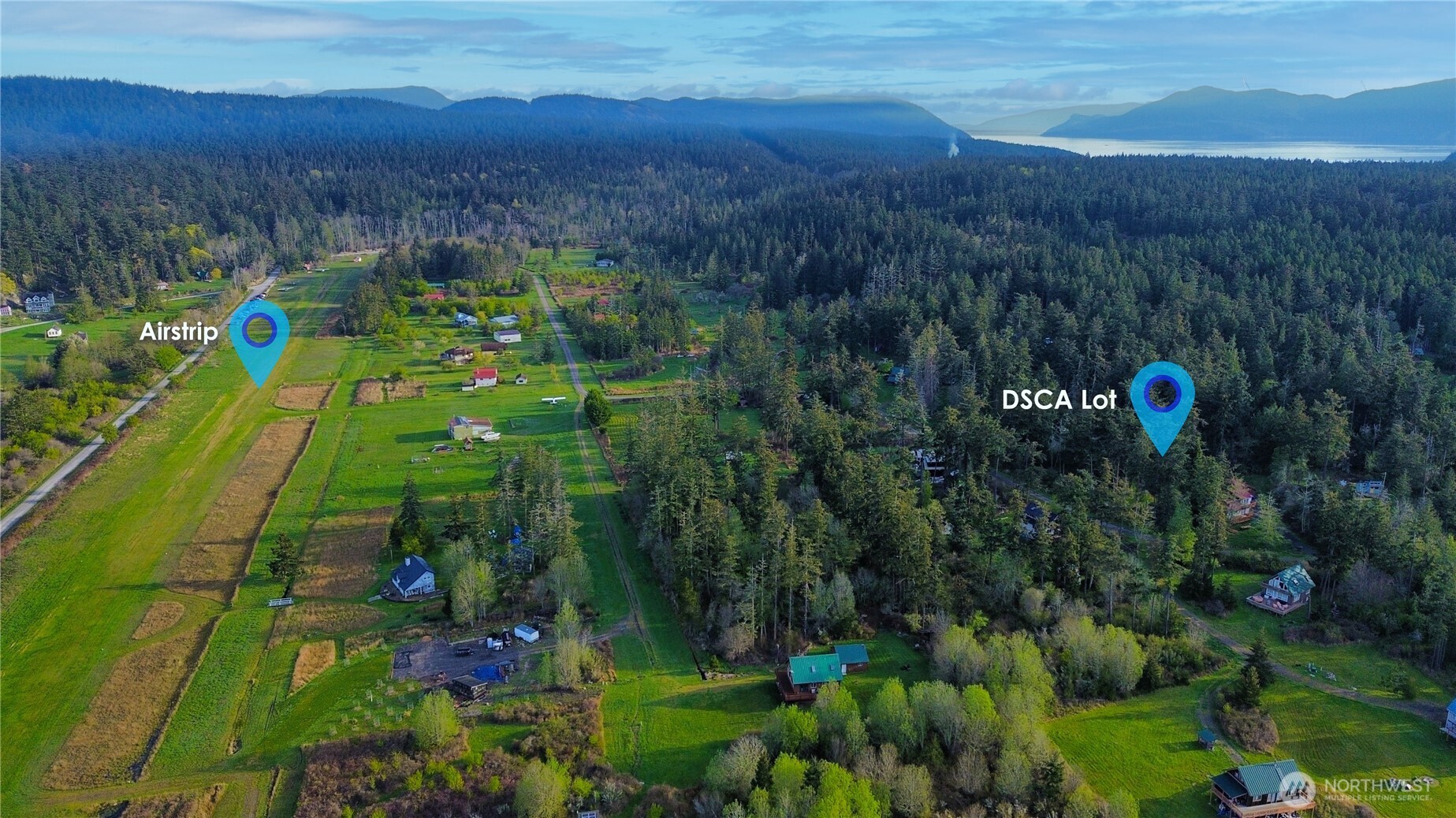 0 Decatur Beach Lane Anacortes, WA 98221 - Photo 5 of 20 a view of a garden with a house