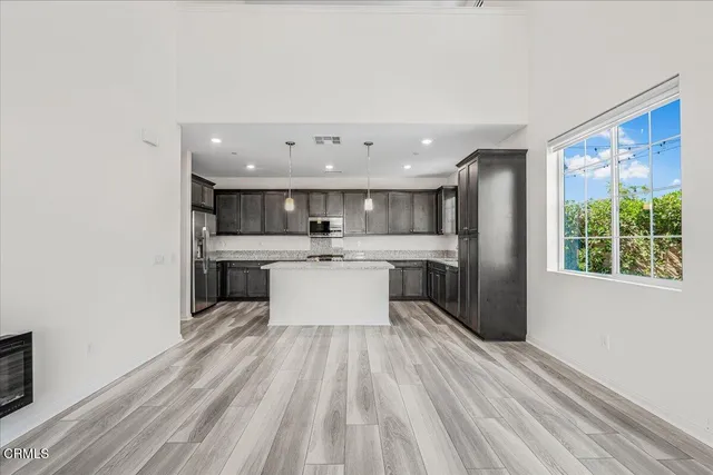 a white bath tub sitting next to a window