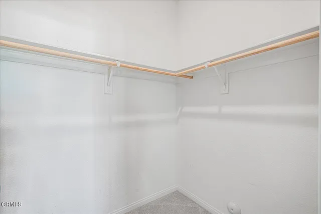 a outdoor space with lots of white furniture