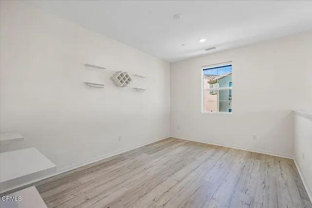a view of a street with houses