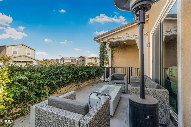 a view of a house with a flower garden
