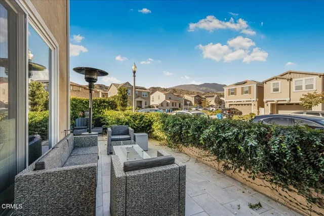 a view of a room with wooden floor and window