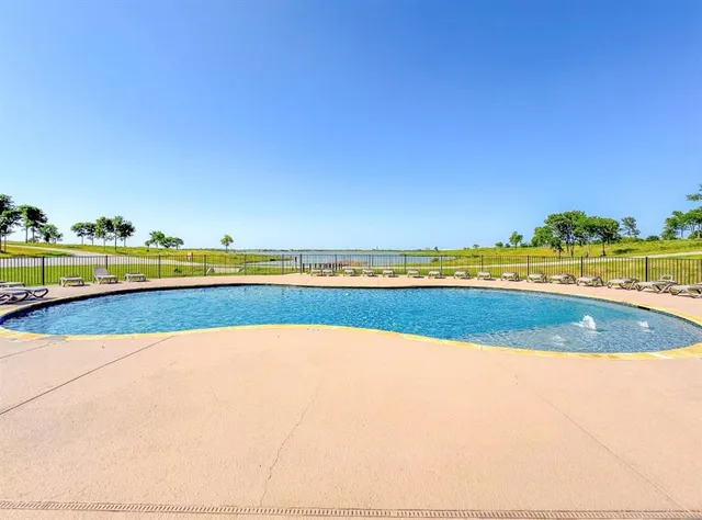 a view of an outdoor space and swimming pool