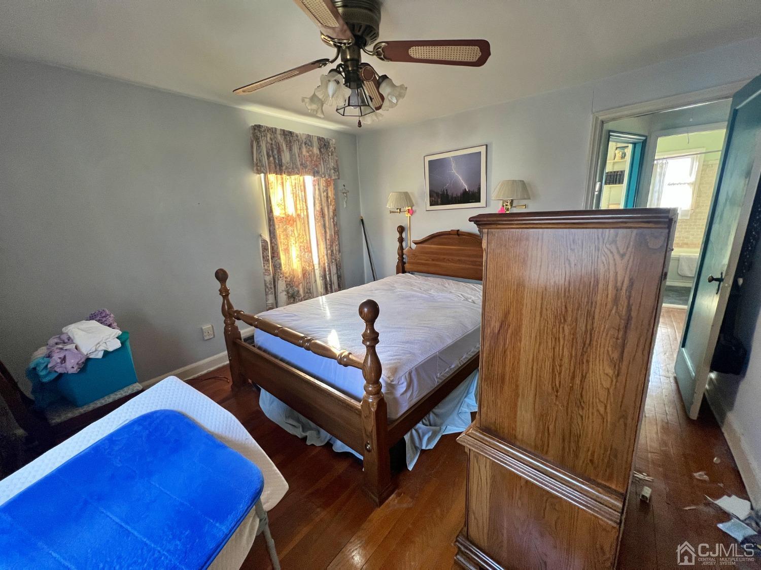 118 MacArthur Drive Edison, NJ 08837 - Photo 12 of 16 a bedroom with a bed and window