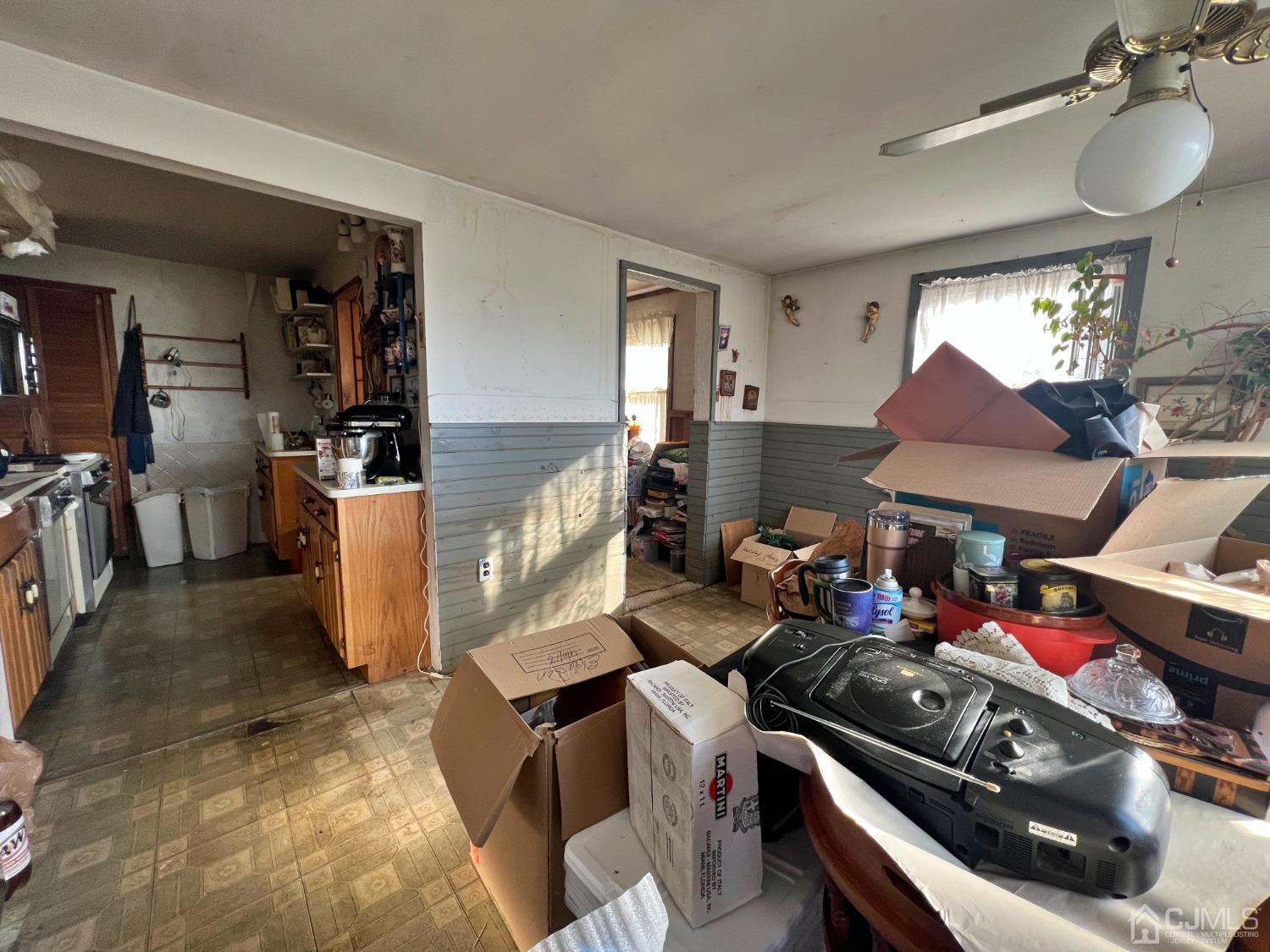 118 MacArthur Drive Edison, NJ 08837 - Photo 8 of 16 a kitchen with a stove and a refrigerator