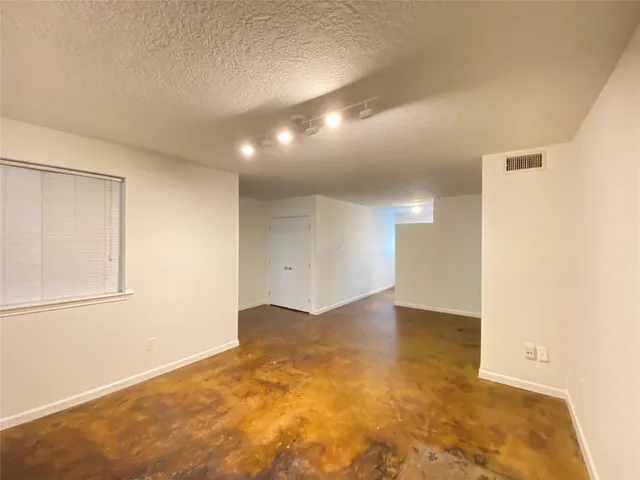 an empty room with a natural light