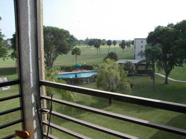 9440 Southwest 8th Street, Unit 408 Boca Raton, FL 33428 - Photo 1 of 7 Primary Photo