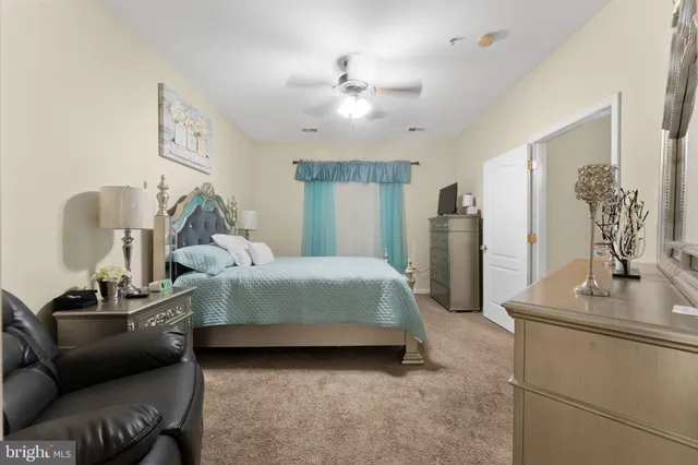 a bathroom with a tub a sink shower and mirror
