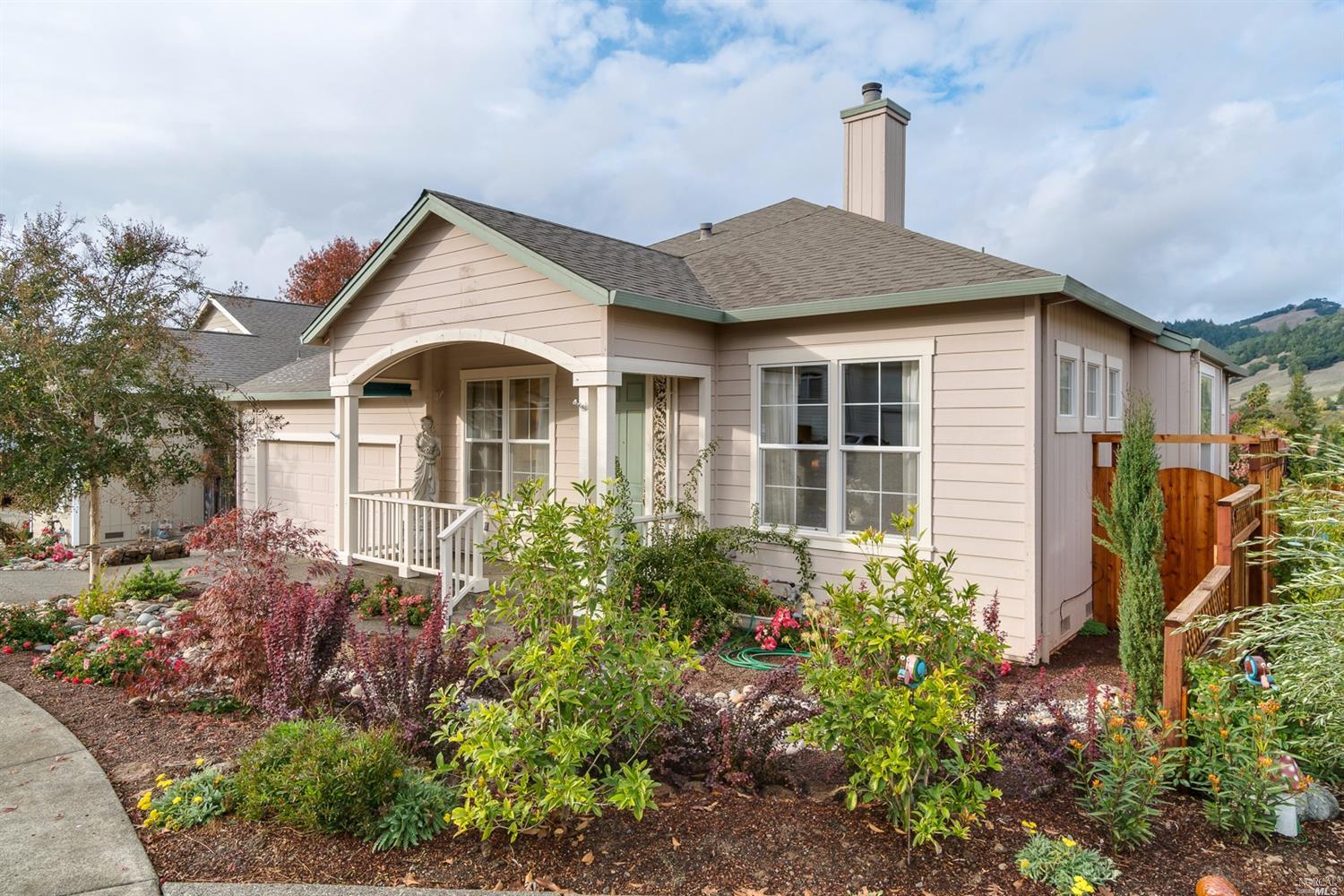5512 Rainbow Circle Santa Rosa, CA 95409 - Photo 1 of 1 a view of a house with brick walls and potted plants