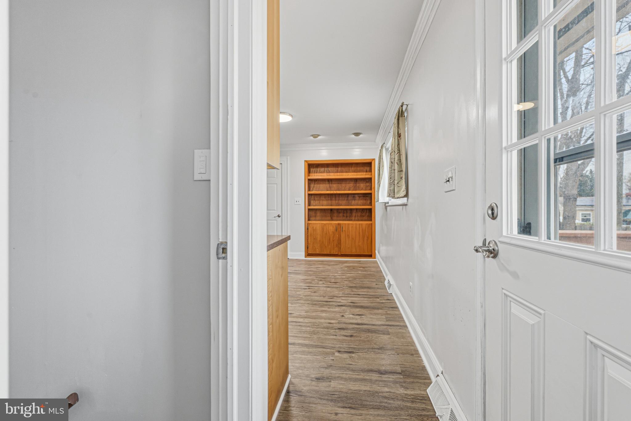 603 Tupelo Court Edgewood, MD 21040 - Photo 18 of 40 a view of a hallway with wooden floor and staircase
