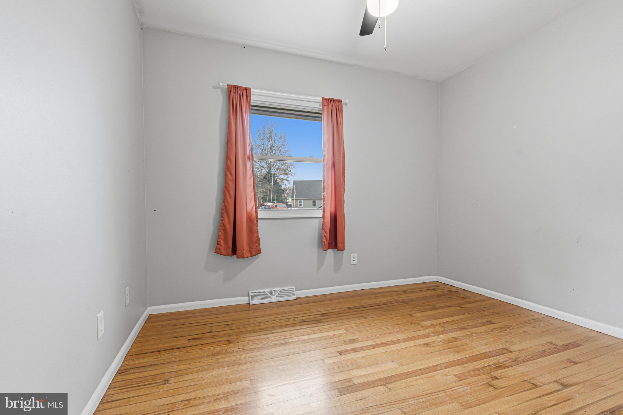 603 Tupelo Court Edgewood, MD 21040 - Photo 24 of 40 a room with a window and a wooden floor