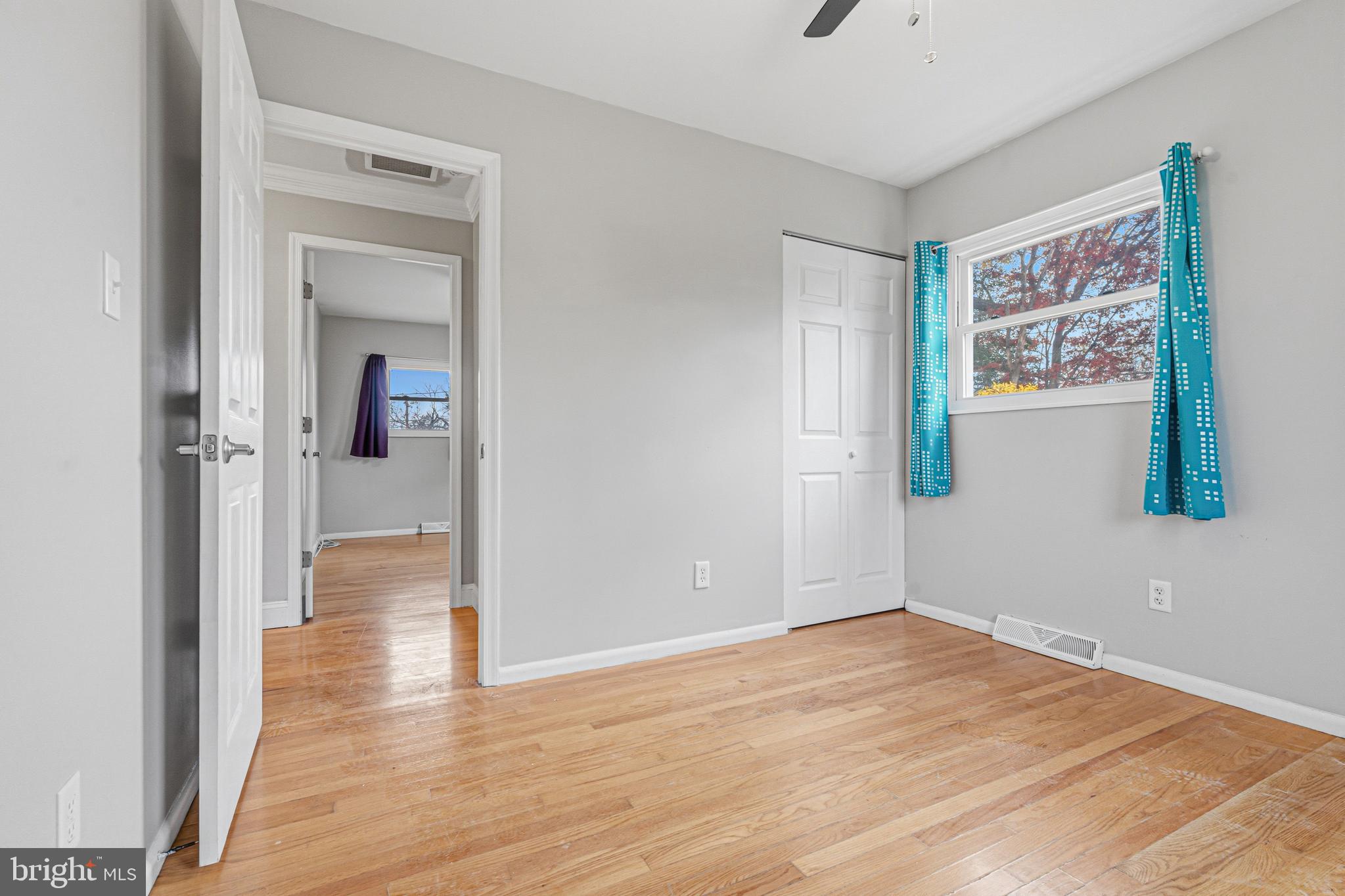603 Tupelo Court Edgewood, MD 21040 - Photo 25 of 40 a view of a hallway with wooden floor and closet