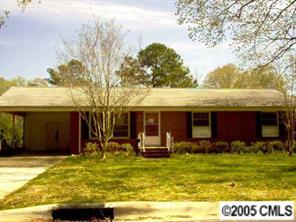 3523 Enfield Road Charlotte, NC 28205 - Photo 1 of 1 a view of a house with backyard porch and furniture