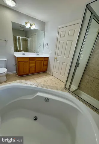 a view of a hallway with a chandelier
