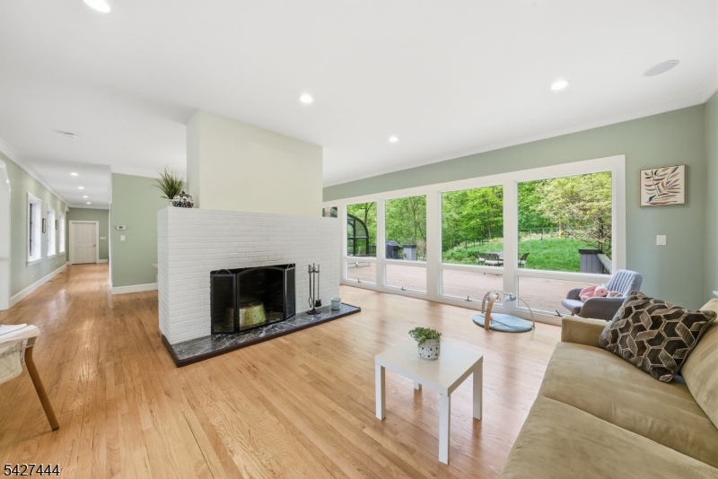 156 Kingsland Road Boonton, NJ 07005 - Photo 5 of 38 a living room with furniture large window and a fireplace
