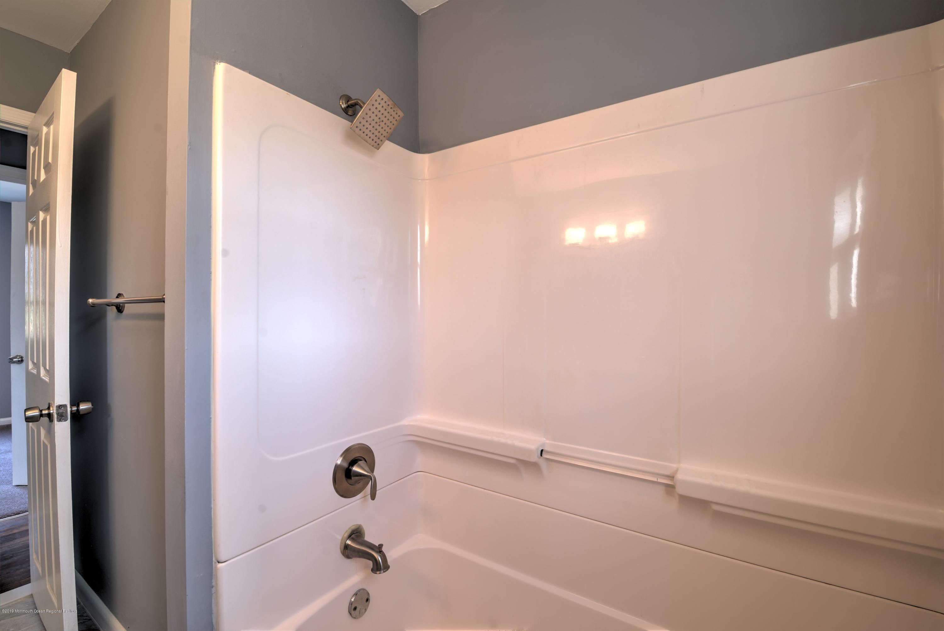 48 Mallard Road Bayville, NJ 08721 - Photo 22 of 25 a bathroom with a shower