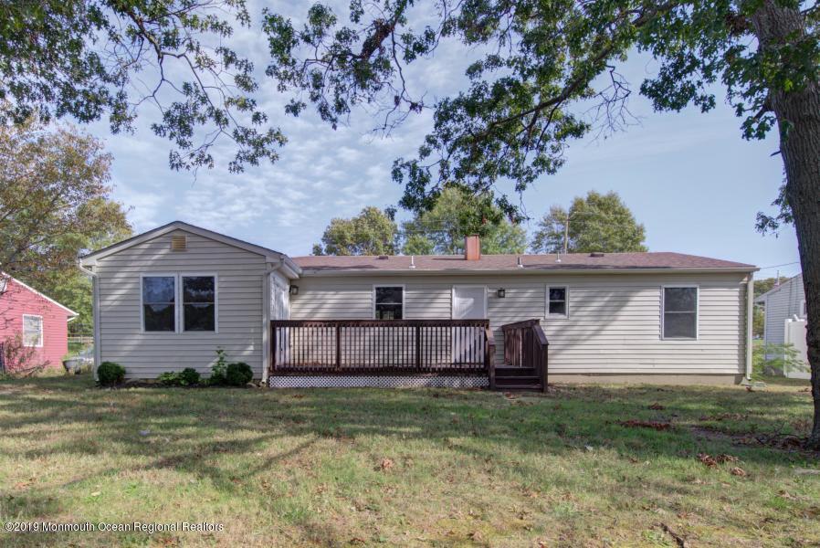48 Mallard Road Bayville, NJ 08721 - Photo 24 of 25 a front view of a house with a garden