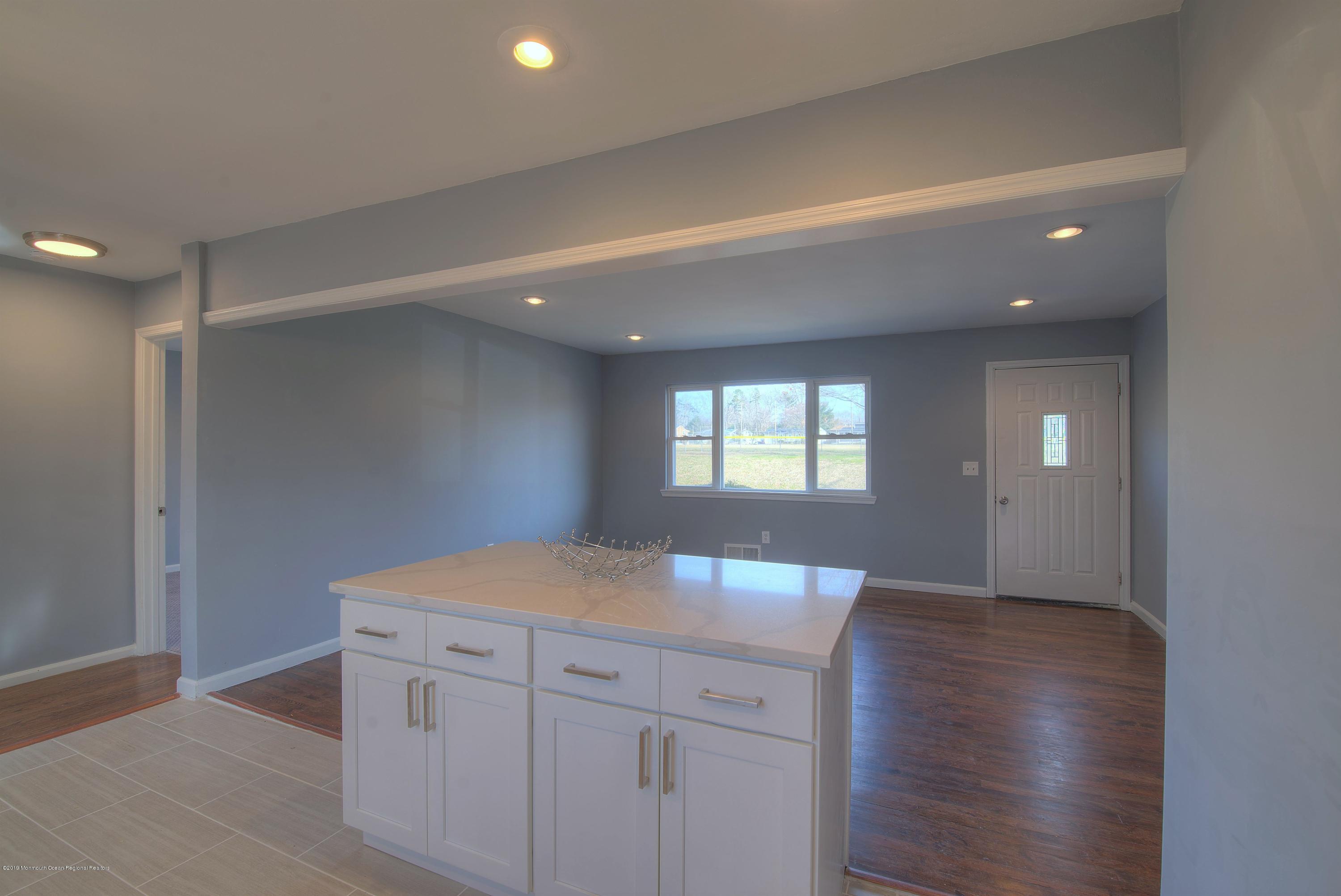 48 Mallard Road Bayville, NJ 08721 - Photo 10 of 25 a view of a kitchen cabinets and a wooden floor