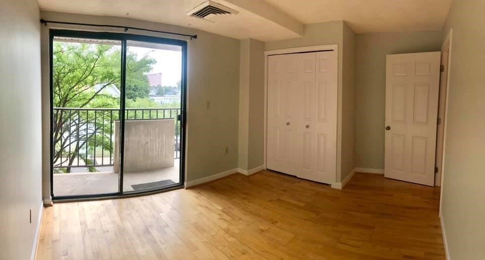 39 Parlin Street, Unit 203 Everett, MA 02149 - Photo 13 of 20 a view of an empty room and window