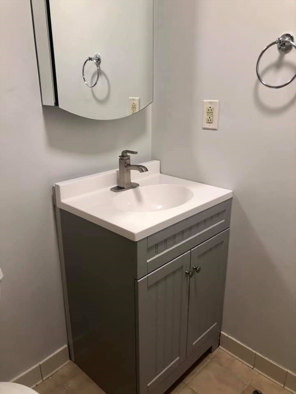39 Parlin Street, Unit 203 Everett, MA 02149 - Photo 15 of 20 a utility room with dryer and washer