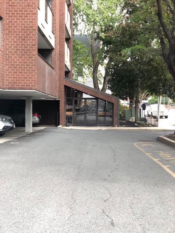 39 Parlin Street, Unit 203 Everett, MA 02149 - Photo 20 of 20 a view of large building with a outdoor space