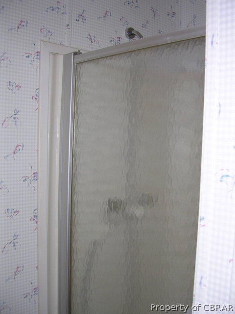 1239 Tabernacle Road Mathews, VA 23109 - Photo 17 of 22 a close view of shower tap