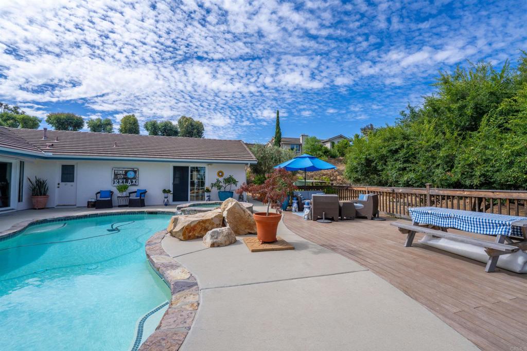 13995 Whispering Meadows Lane Jamul, CA 91935 - Photo 47 of 62 a view of a house with backyard and sitting area