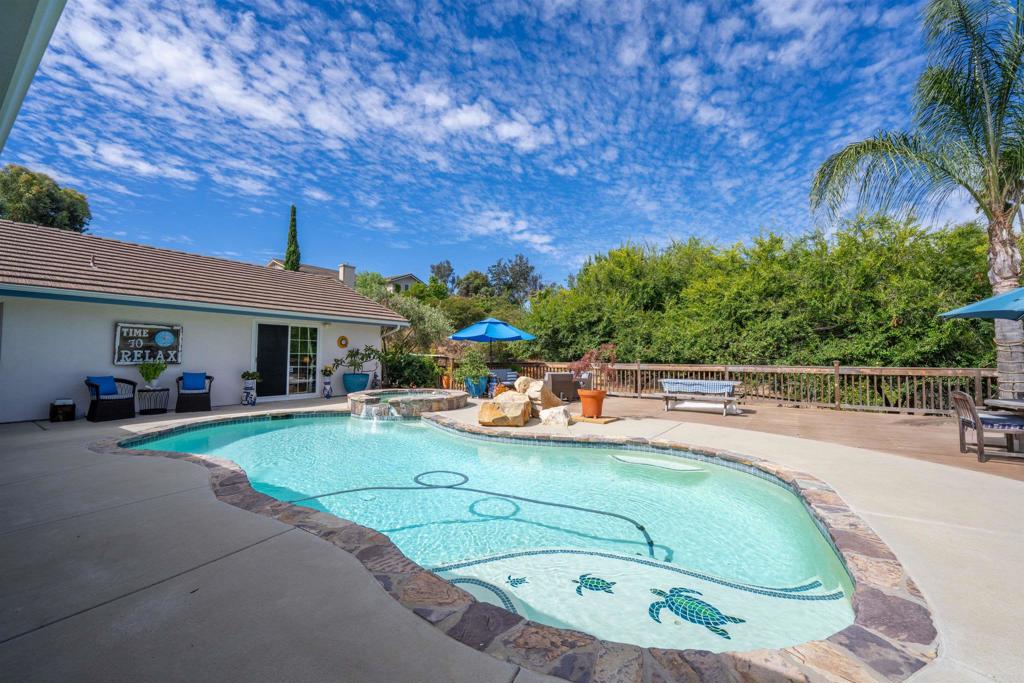 13995 Whispering Meadows Lane Jamul, CA 91935 - Photo 48 of 62 a view of a swimming pool with a patio