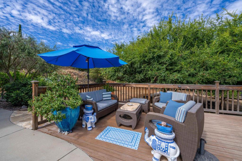 13995 Whispering Meadows Lane Jamul, CA 91935 - Photo 50 of 62 a view of balcony with furniture and wooden deck