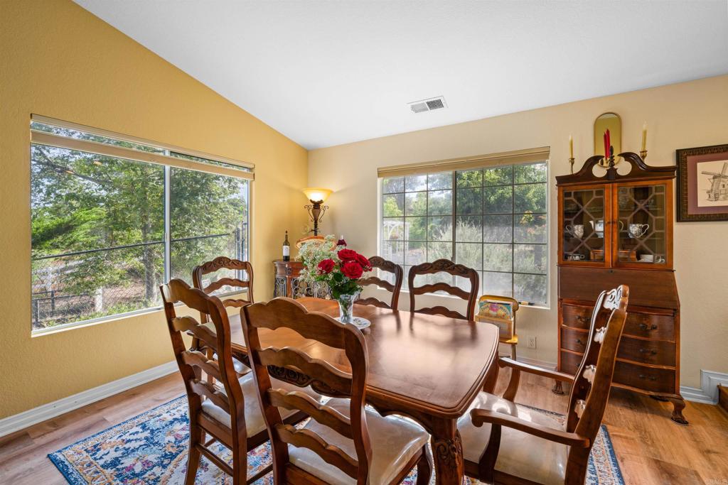 13995 Whispering Meadows Lane Jamul, CA 91935 - Photo 8 of 62 a dining room with furniture and window