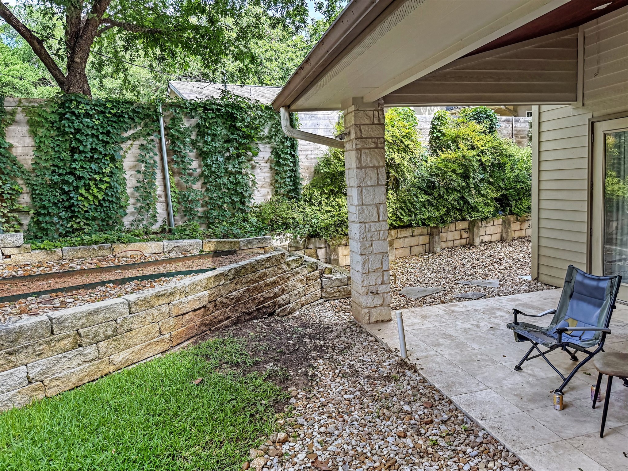 14 Scott Crescent Austin, TX 78703 - Photo 3 of 6 a backyard of a house with outdoor seating