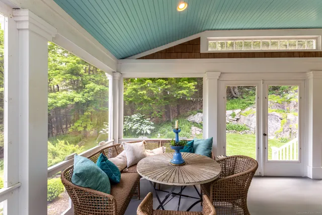 a outdoor dining space with furniture and garden view