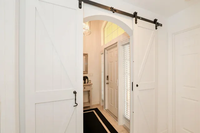 a view of a bathroom with a glass door