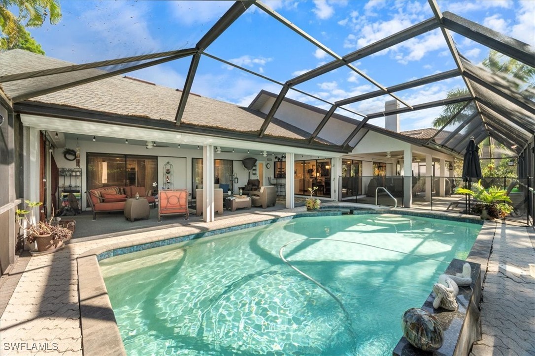 19 Winewood Court Fort Myers, FL 33919 - Photo 30 of 42 a view of a backyard with swimming pool