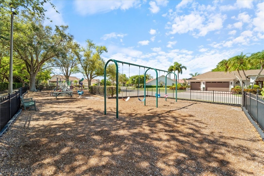 19 Winewood Court Fort Myers, FL 33919 - Photo 37 of 42 a view of backyard with tree