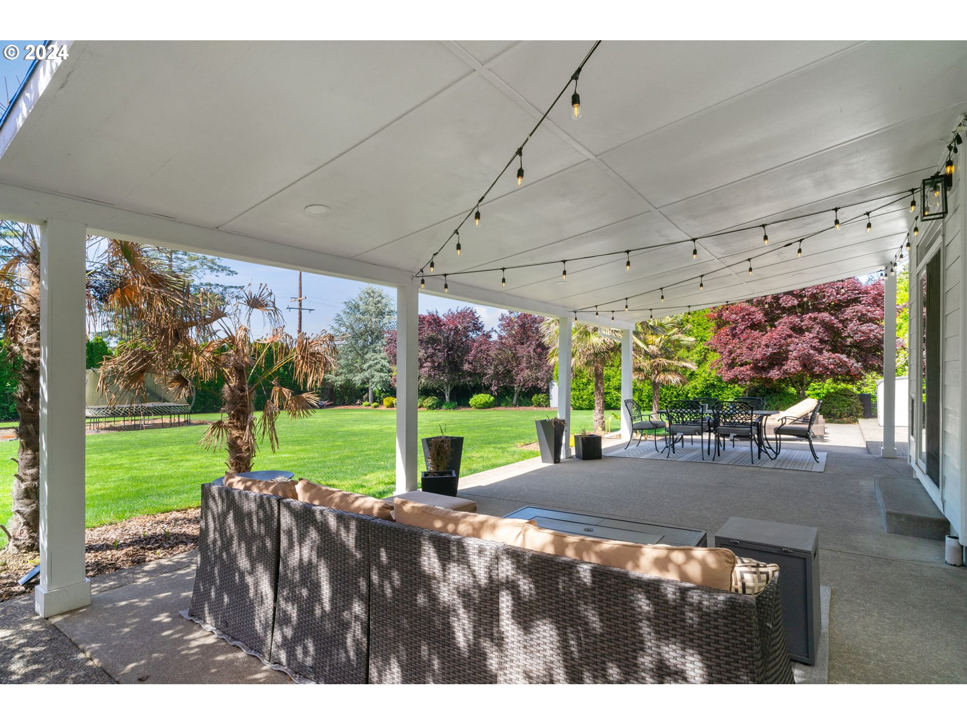 29090 Southeast Powell Valley Road Gresham, OR 97080 - Photo 33 of 45 a view of a patio with a table and chairs