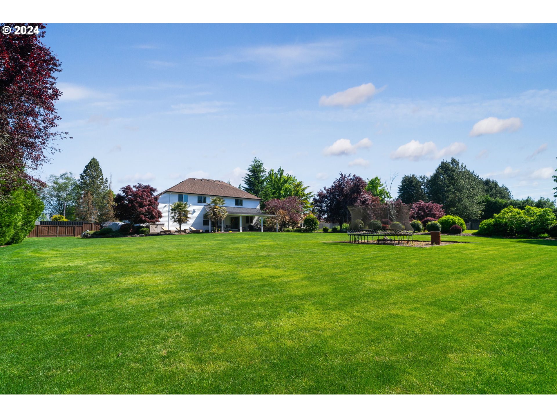 29090 Southeast Powell Valley Road Gresham, OR 97080 - Photo 40 of 45 a view of yard with grass and trees