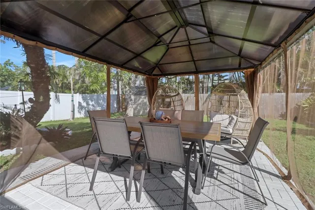 an aerial view of house with a swimming pool