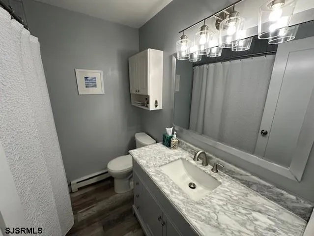 a bathroom with a double vanity sink and mirror