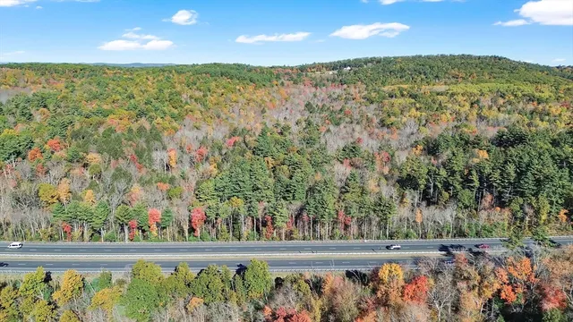 a view of a yard with an outdoor space
