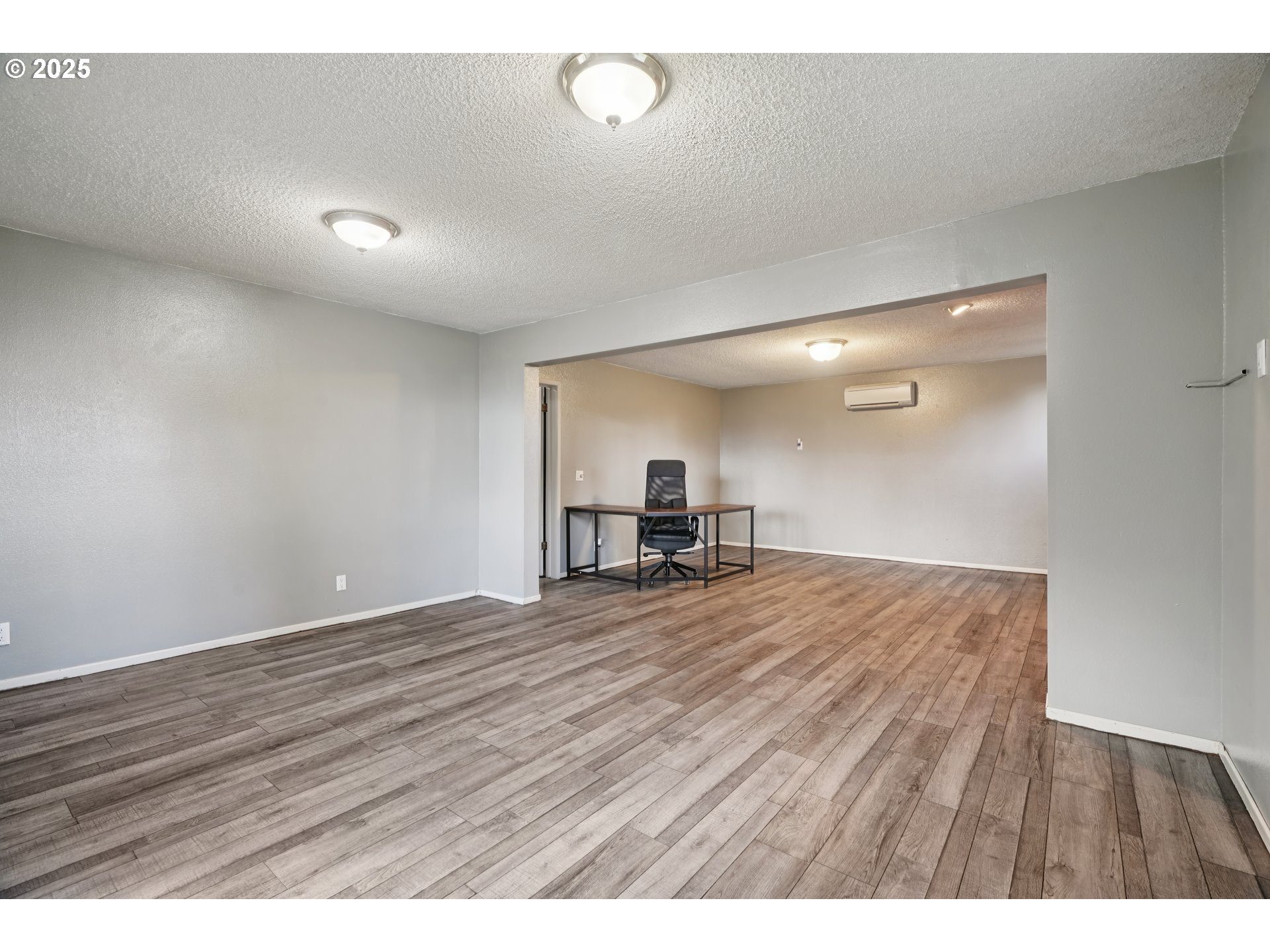 130 Stella Lane Longview, WA 98632 - Photo 15 of 41 a view of empty room with wooden floor