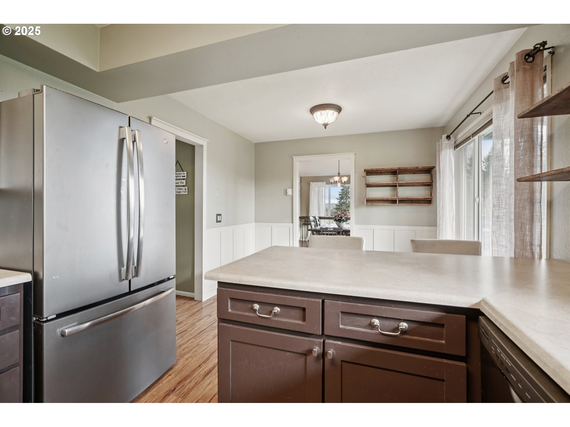 130 Stella Lane Longview, WA 98632 - Photo 18 of 41 a kitchen with a refrigerator and countertop