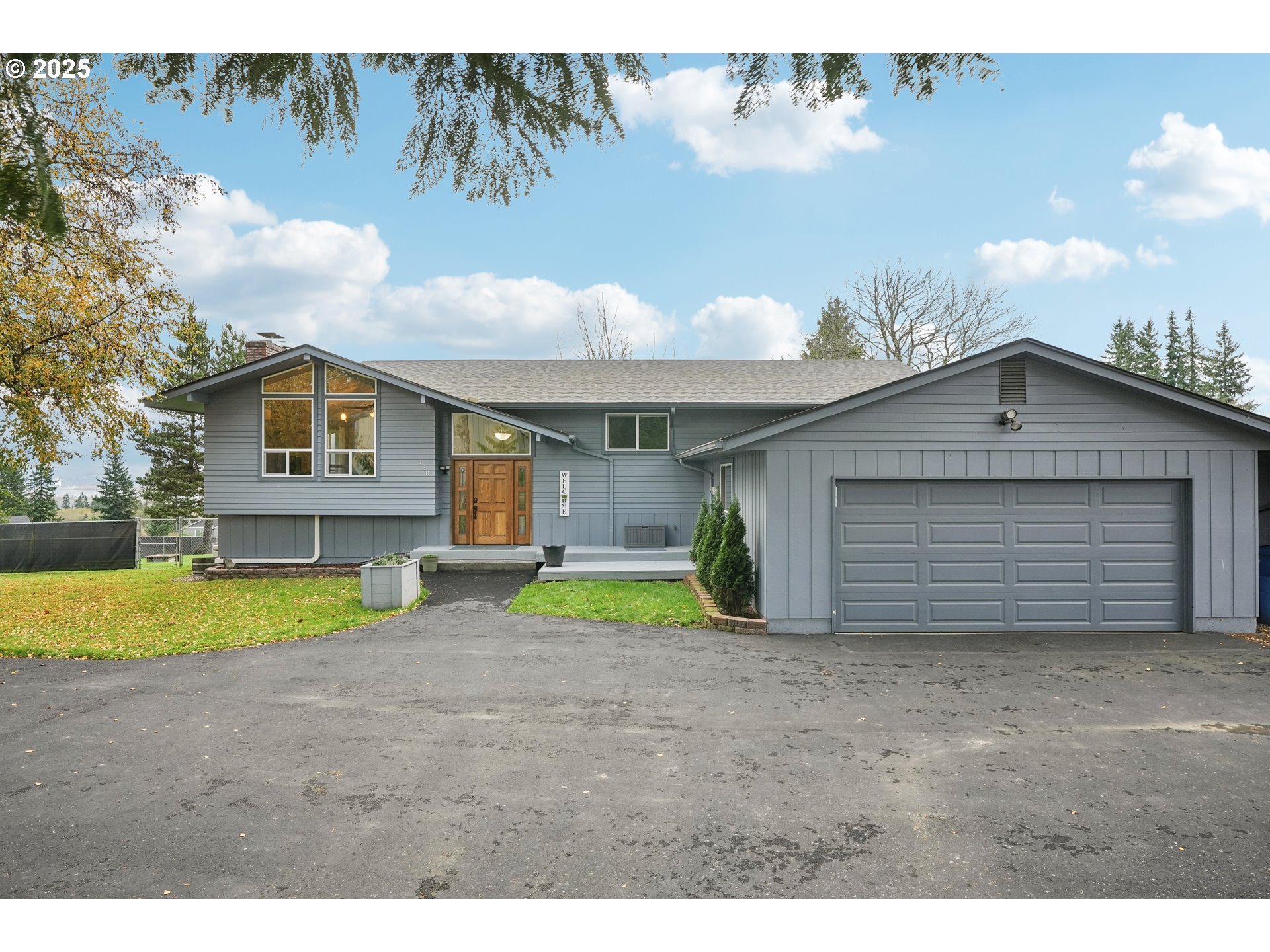 130 Stella Lane Longview, WA 98632 - Photo 3 of 41 a view of outdoor space yard and front view of a house