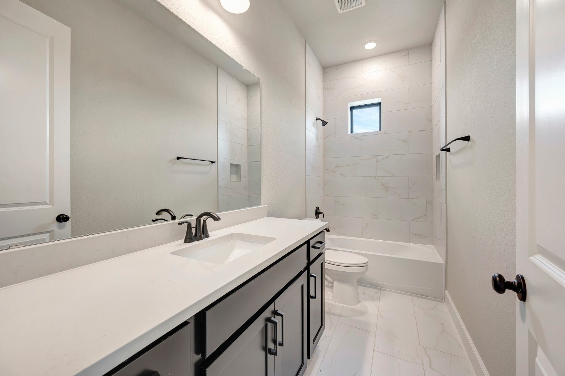 2722 Cottage Place Rosharon, TX 77583 - Photo 17 of 50 a bathroom with a sink a toilet and shower