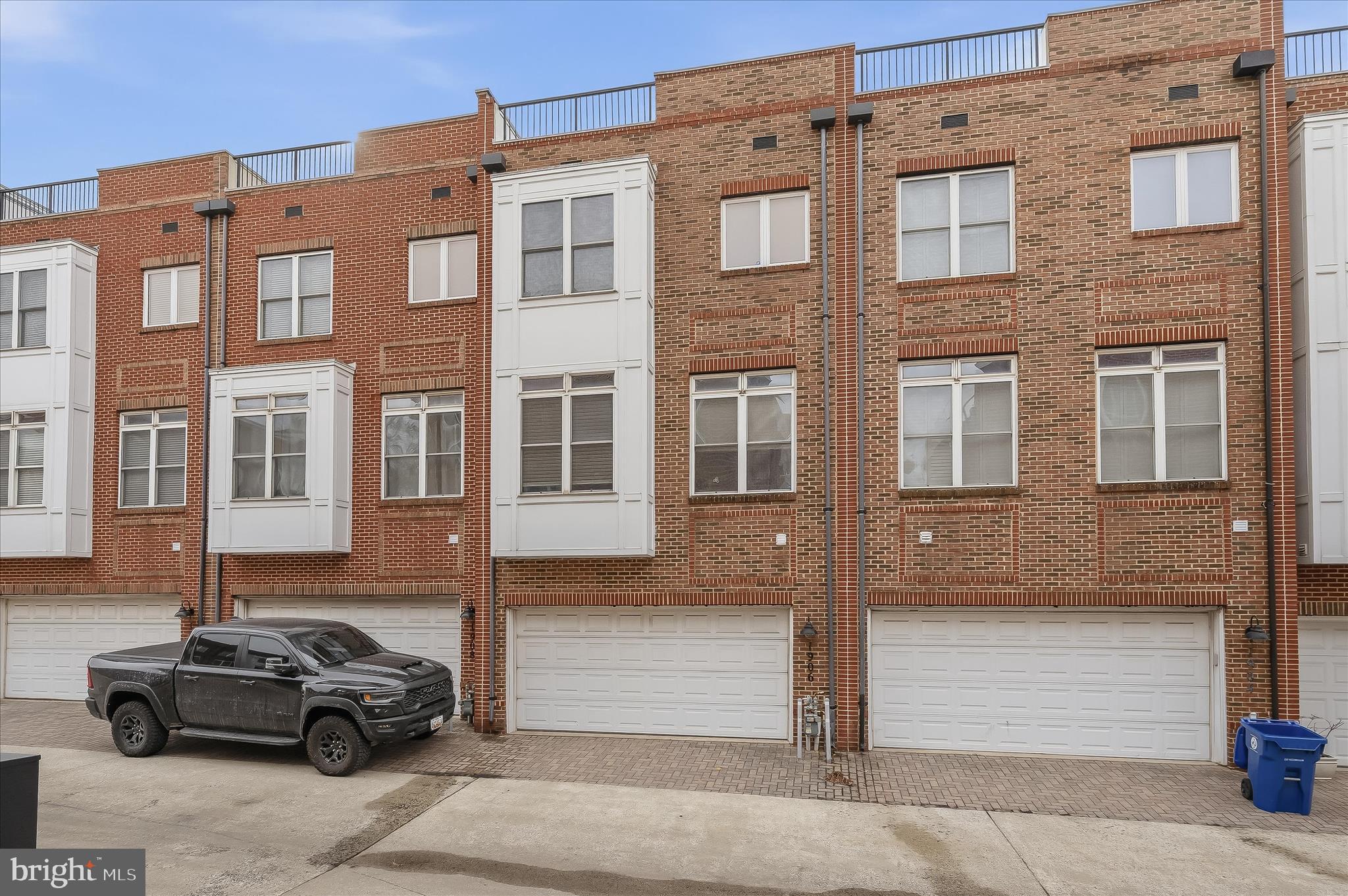 1906 East Fort Avenue Baltimore, MD 21230 - Photo 4 of 7 a car parked in front of a building