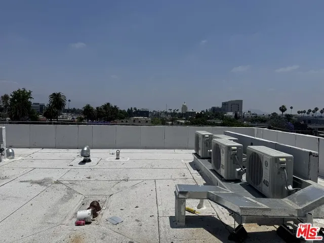 a view of a terrace with chairs