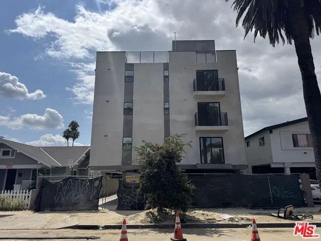 a front view of a house with street