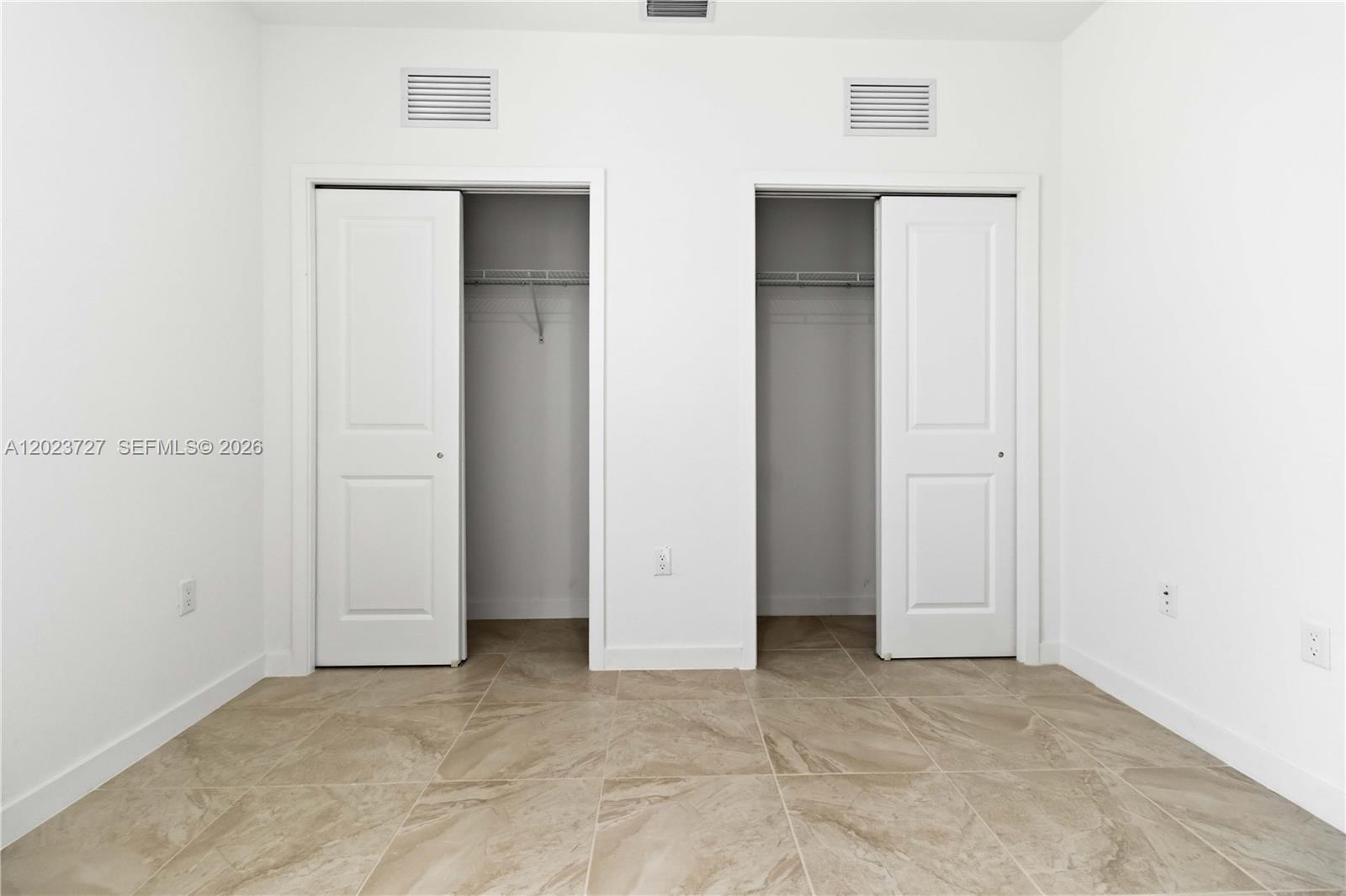22348 Southwest 115th Court, Unit 22348 Miami, FL 33170 - Photo 30 of 37 an empty room with closet