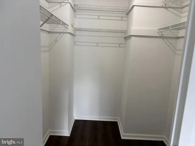 a view of a room with racks on the wall